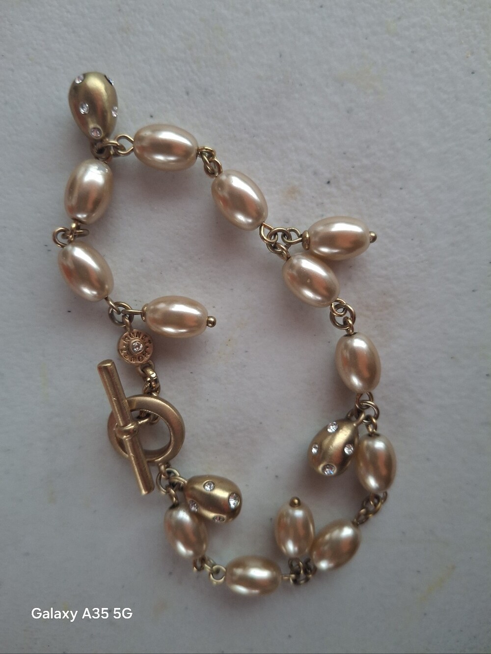Monet champagne color Pearls and rhinestone bracelet with Toggle clasp AB